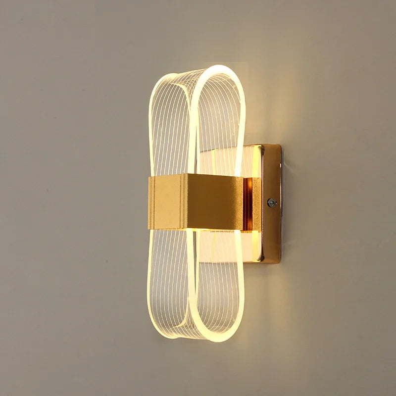 arandela dourada moderna, arandela led decorativa, arandela laço dourado, arandela para quarto, arandela de parede luxo, iluminação moderna parede, arandela led sala